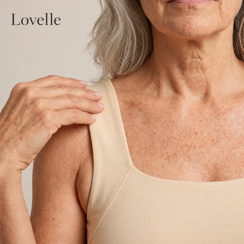 Lähikuva Lovelle Ease -topin leveästä, pehmeästä olkaimesta, väri nude